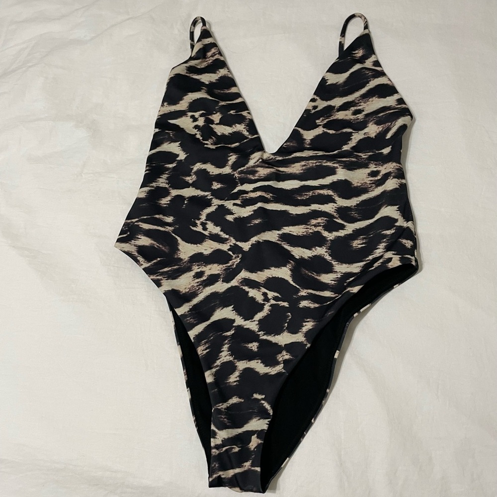 Wanderlust one piece swim suit. Small